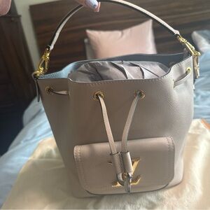 Elegant Lockme Beige Bucket Bag